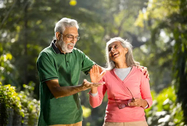 Caregiver assisting an elderly woman